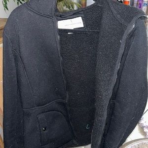Black medium length thick coat